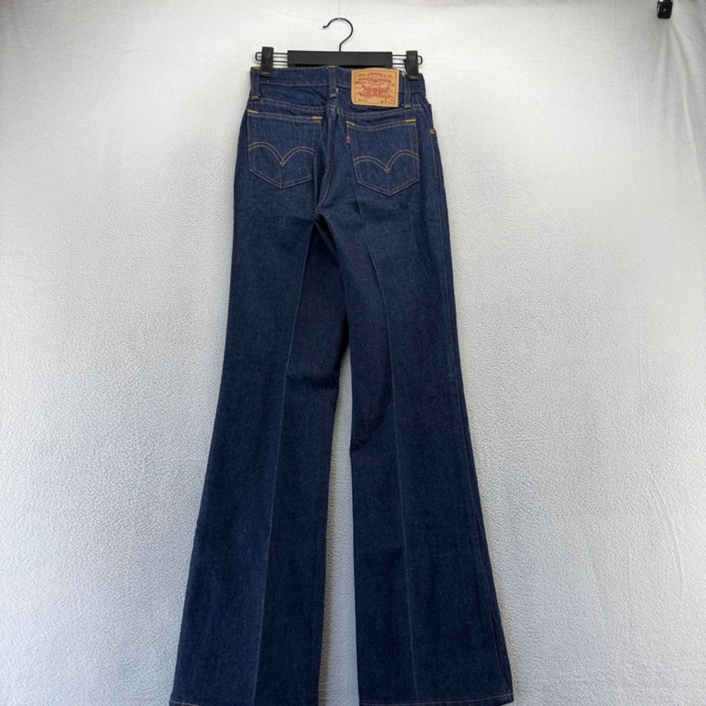 Vintage Levis jeans Women's 25x29 Blue Denim Dark Wash Bell Bottom Flared Wide